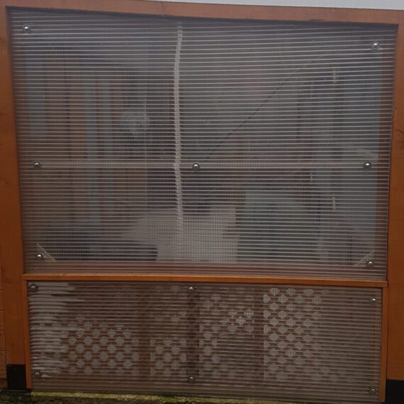 Polycarb sheets covering the exterior of the aviary